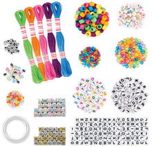 Assorted craft supplies including colorful beads, ribbons, and letter beads on a white background.